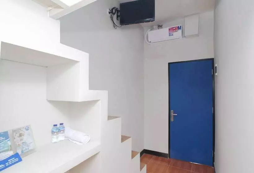 Retkeilymaja Kamar Keluarga Bandara Mas Syariah