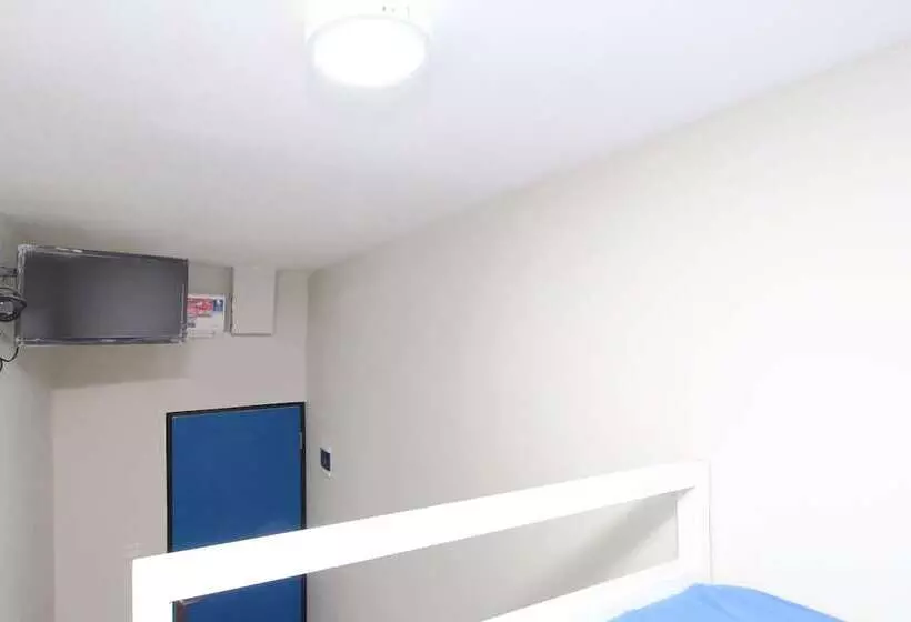 Retkeilymaja Kamar Keluarga Bandara Mas Syariah