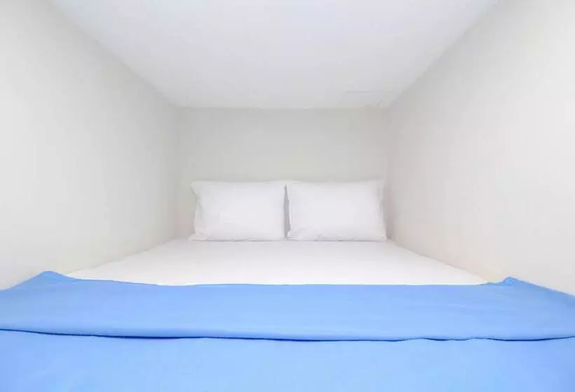 Retkeilymaja Kamar Keluarga Bandara Mas Syariah