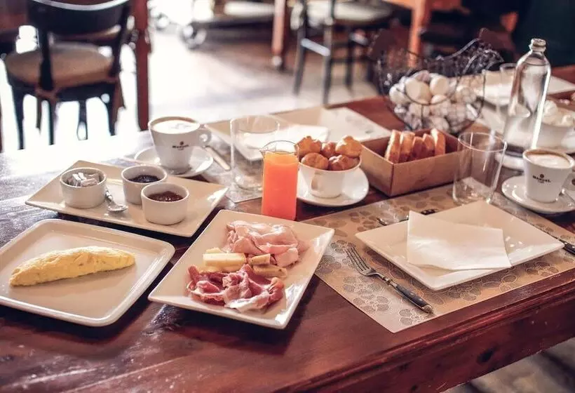 تختخواب و صبحانه Locanda Orologio