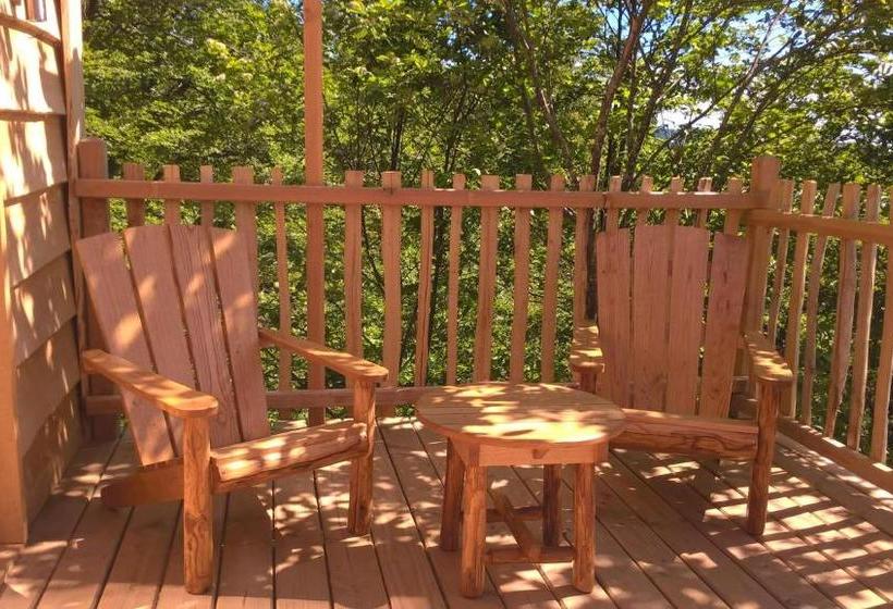 צימר Cabanes Du Hérisson, Cabanes Perchées De Standing Avec Spa