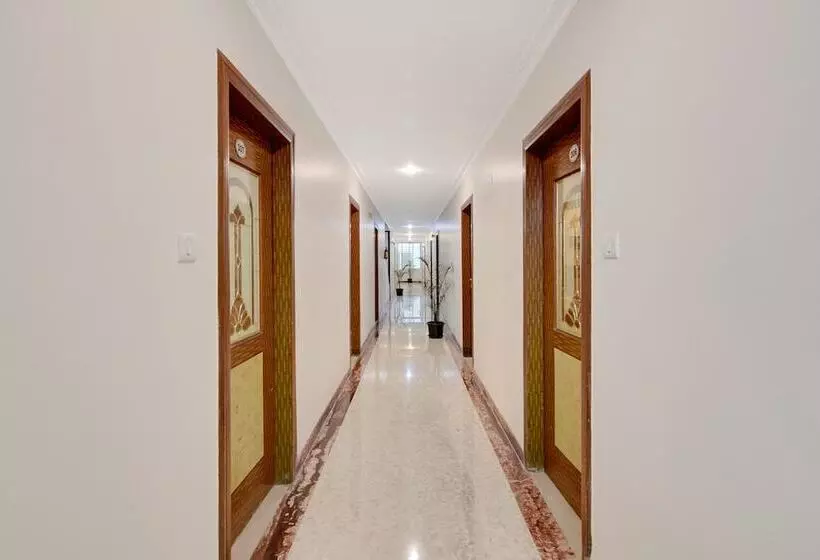 Capital O Elegant Amethyst Business Hotel Near Ragigudda Sri Prasanna Anjaneyaswamy Temple