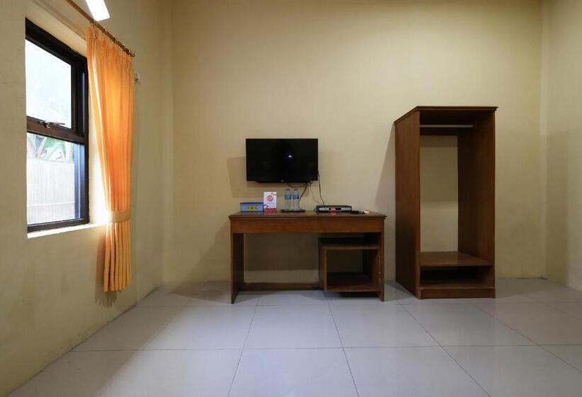 Отель Oyo 2025 Wisma Musdalifa