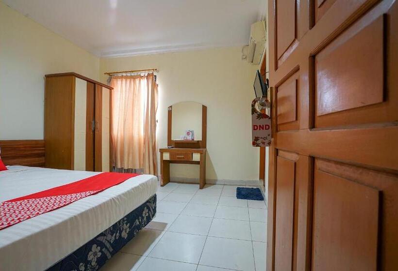 Отель Oyo 2025 Wisma Musdalifa