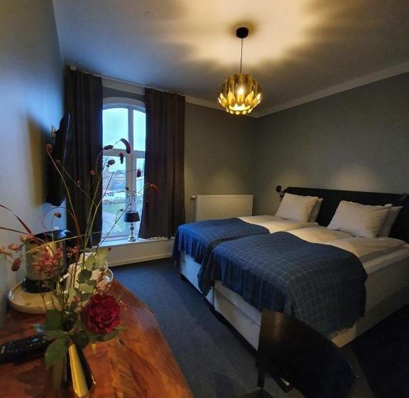 هتل L Carl Friman