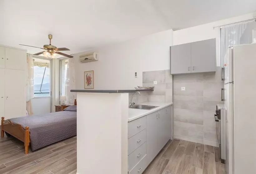 M K Apartments