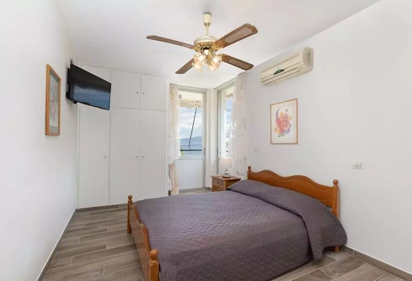 M K Apartments