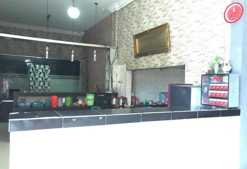 ホテル Oyo 1883 Mulia Tiza