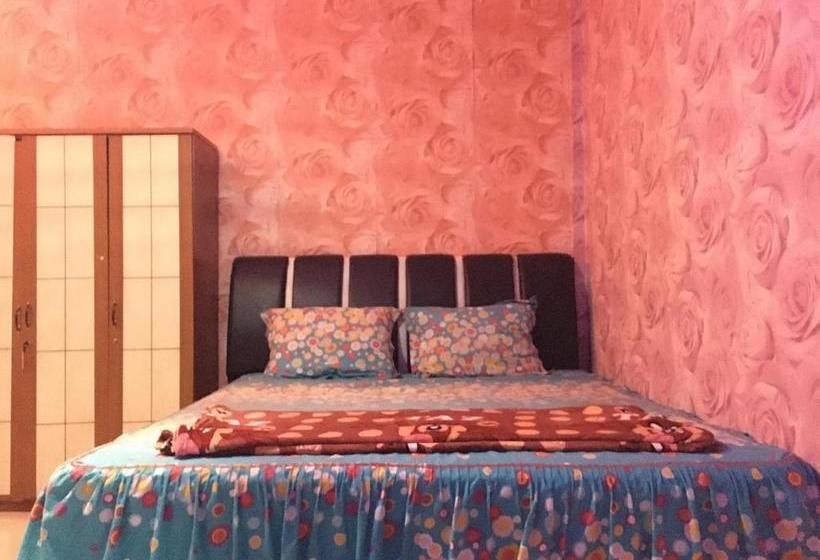 ホテル Oyo 1883 Mulia Tiza