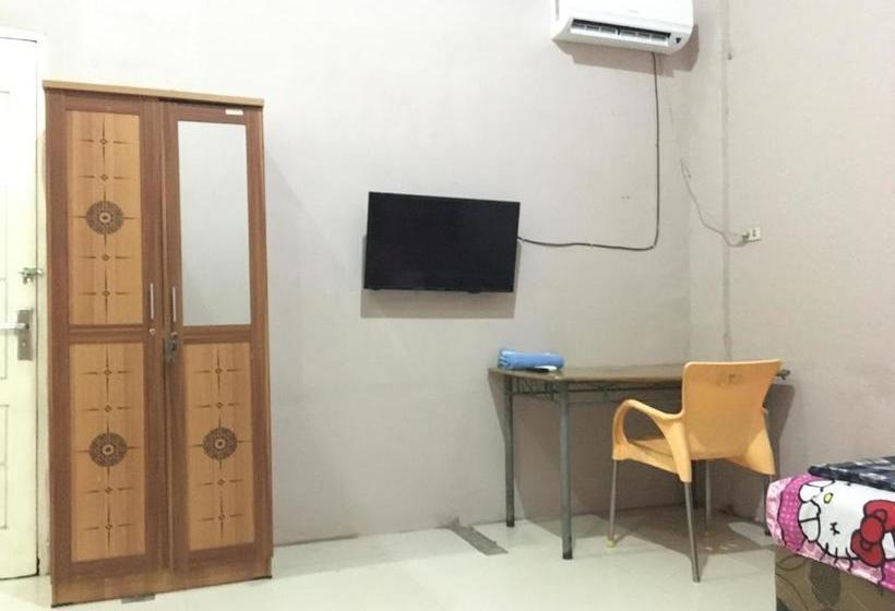 ホテル Oyo 1883 Mulia Tiza