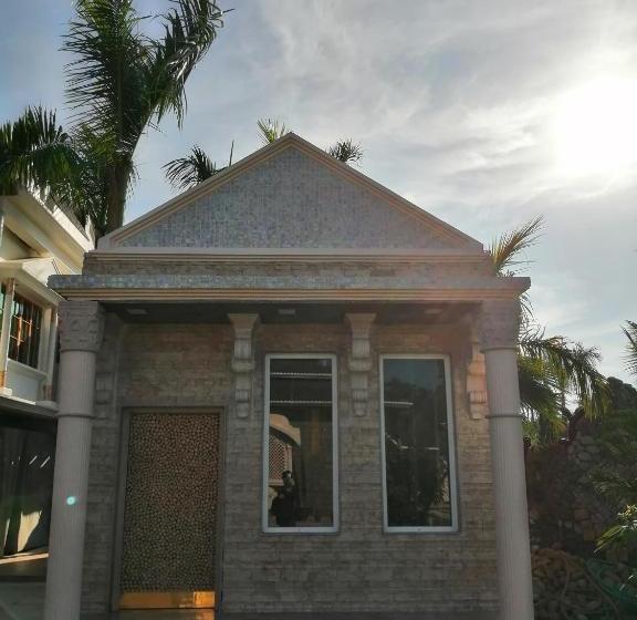 استراحتگاه Mann The Palm Retreat