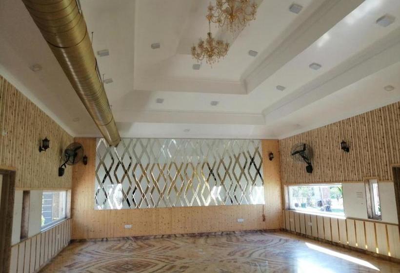 استراحتگاه Mann The Palm Retreat