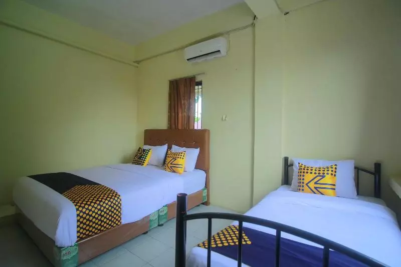 ホテル Spot On 2305 Andys Nur Penginapan