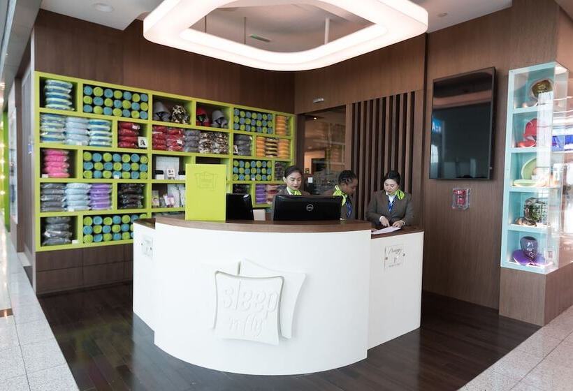 Отель Sleep N Fly Sleep Lounge, A Gates Terminal 3 Transit Only