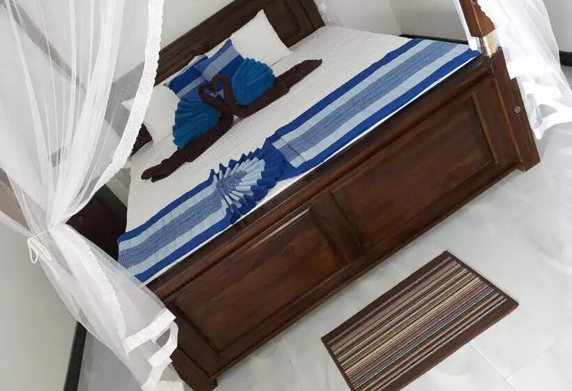 تختخواب و صبحانه The Wave's Guest House