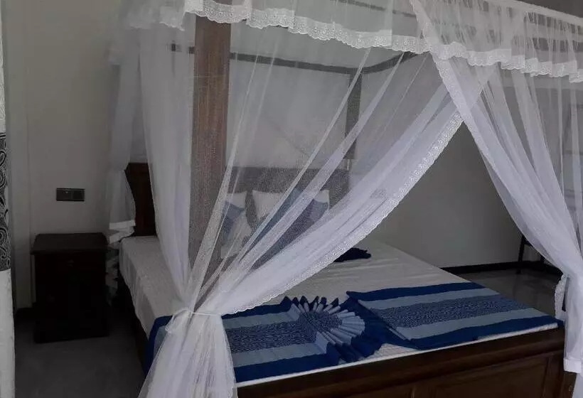 تختخواب و صبحانه The Wave's Guest House