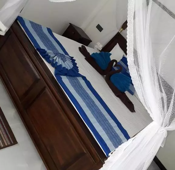 تختخواب و صبحانه The Wave's Guest House