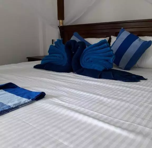 تختخواب و صبحانه The Wave's Guest House