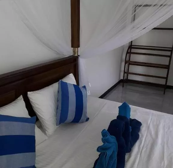 تختخواب و صبحانه The Wave's Guest House