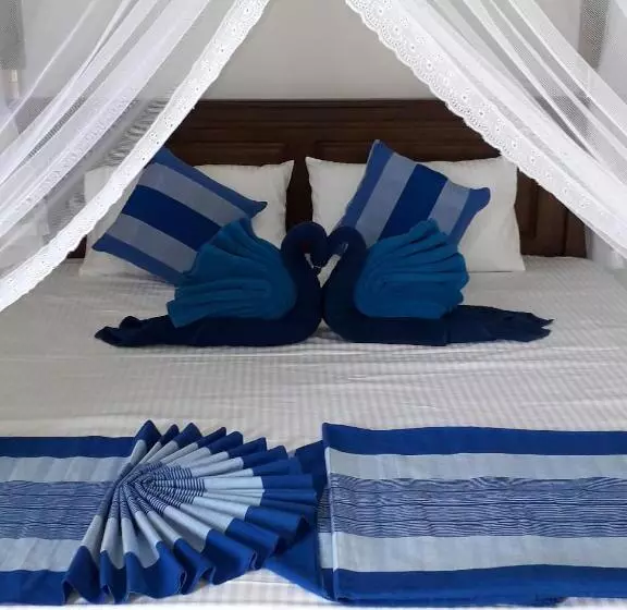 تختخواب و صبحانه The Wave's Guest House