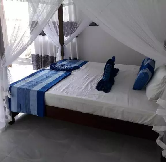 تختخواب و صبحانه The Wave's Guest House