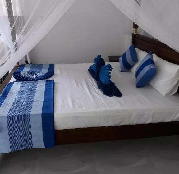 تختخواب و صبحانه The Wave's Guest House