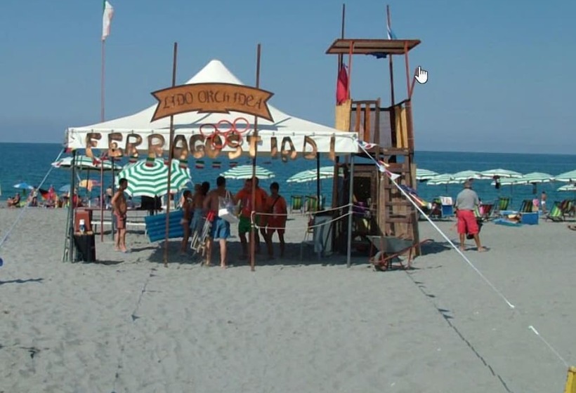 Отель Villaggio Camping Orchidea