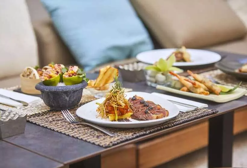 Puro Hotel Oasis Urbano