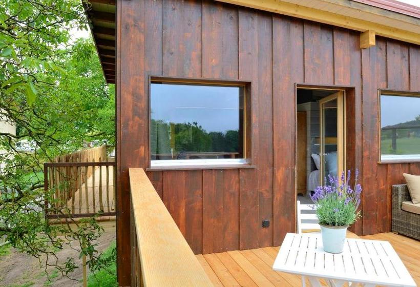 Bed and Breakfast Cabane Dans Les Arbres / Swin Golf De Cremin