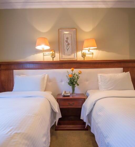 هتل Villa Morra Suites