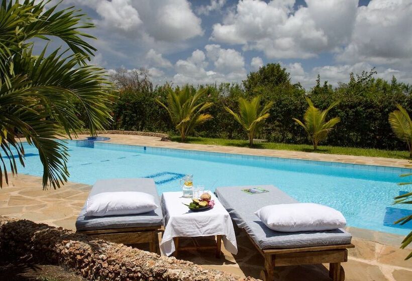 هتل Sheba Cottages