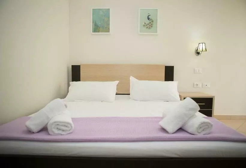 تختخواب و صبحانه Perivolos Apartments