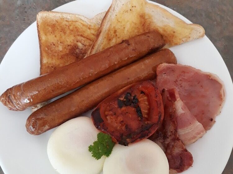 모텔 Country Gardens Motor Inn