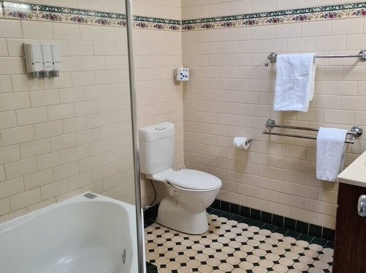 모텔 Country Gardens Motor Inn