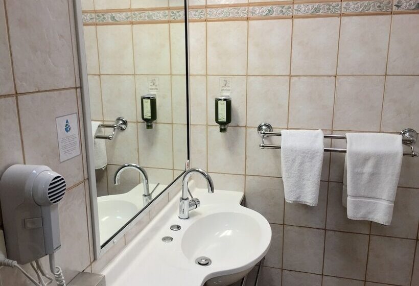 모텔 Country Gardens Motor Inn