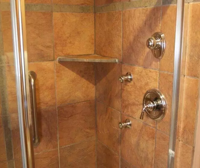 هتل Sleepy Forest Cottages