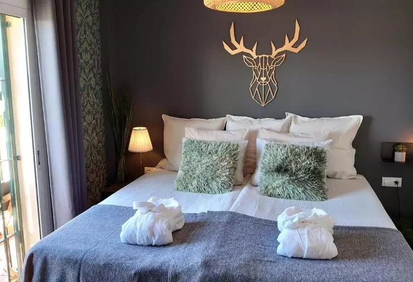 Majatalo Carmen Rooms    Boutique B&b By The Sea