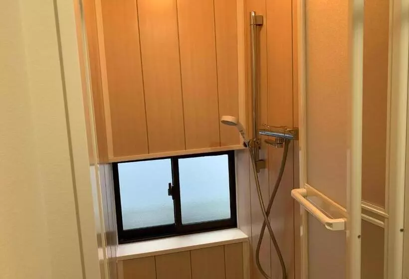 ペンション Guest Cafe Kuchikumano