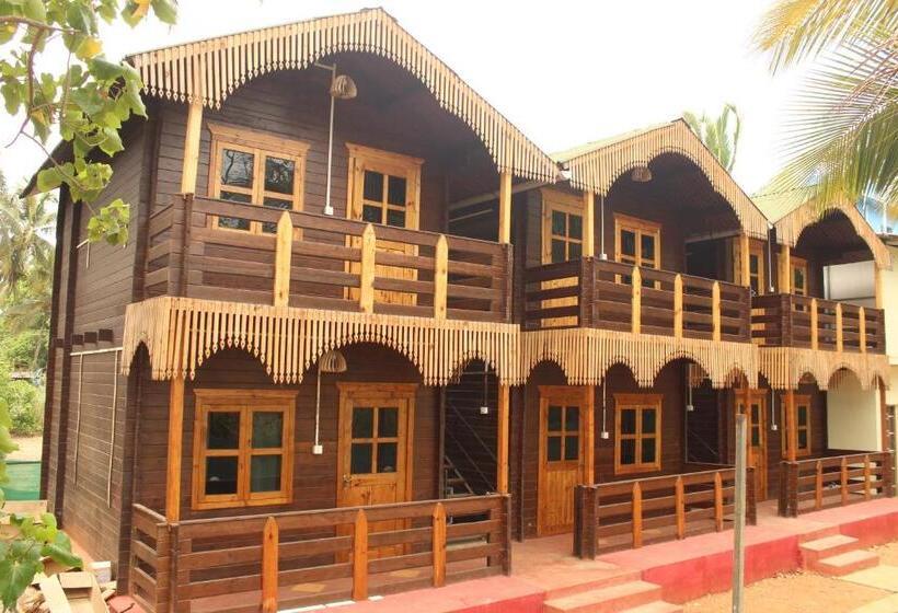 Отель Lotusfeet Beach Resort Morjim