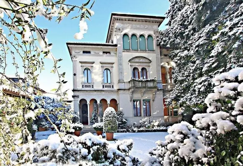 Отель Villa Abbazia Relais & Chateaux