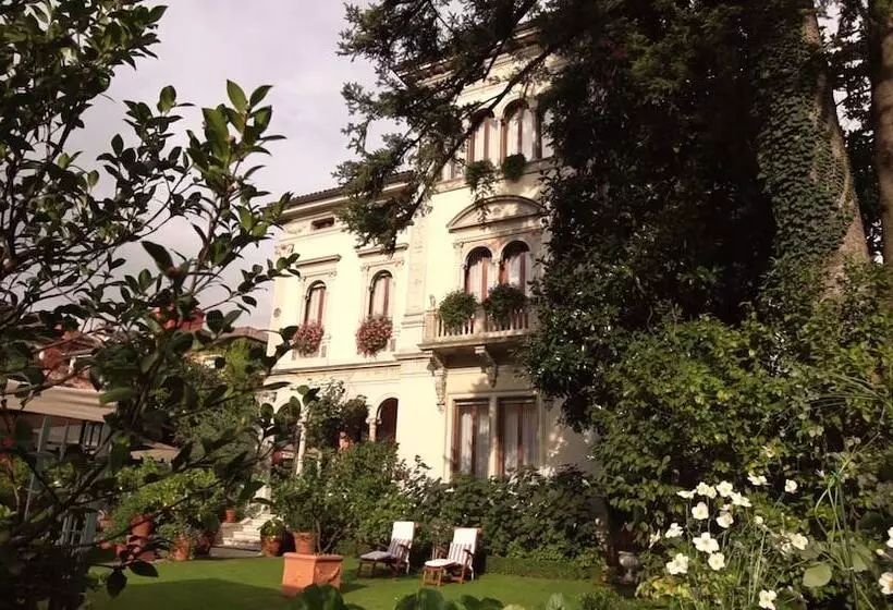 Отель Villa Abbazia Relais & Chateaux