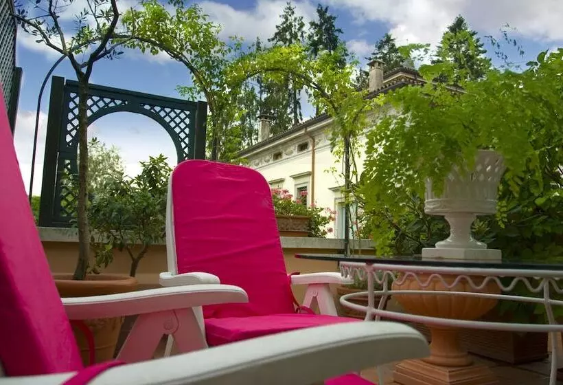 Отель Villa Abbazia Relais & Chateaux