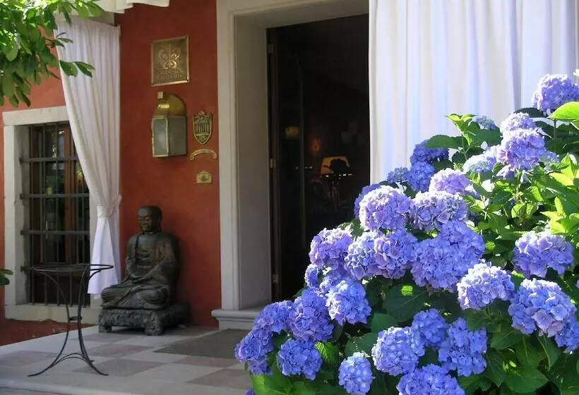 Отель Villa Abbazia Relais & Chateaux