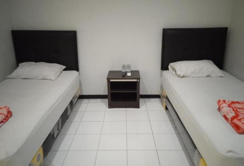 בית מלון כפרי Oyo 90177 Pahlawan