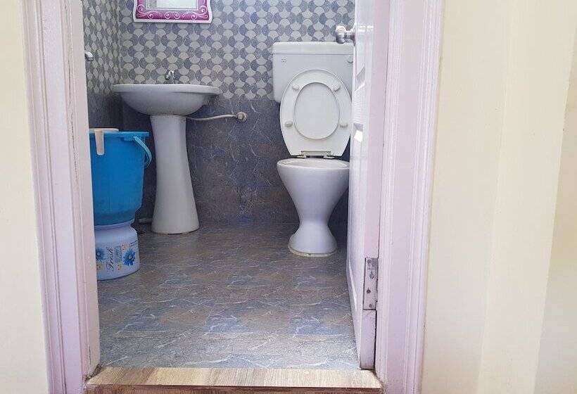 בית מלון כפרי Krishna Tara Comforts