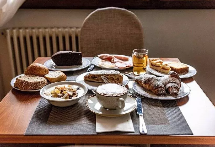 Отель Caminetto