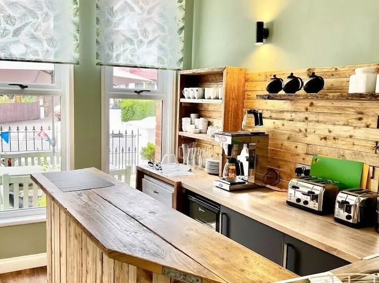 酒店 Devon House Guest House