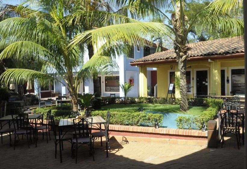 هتل Tropical Gardens Suites And Apartments