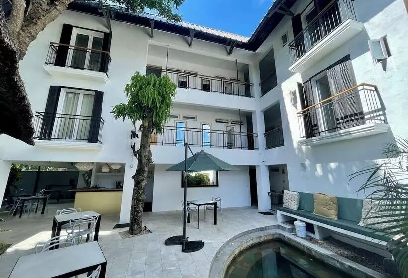 هتل Cosy Guest House Sous Le Badamier