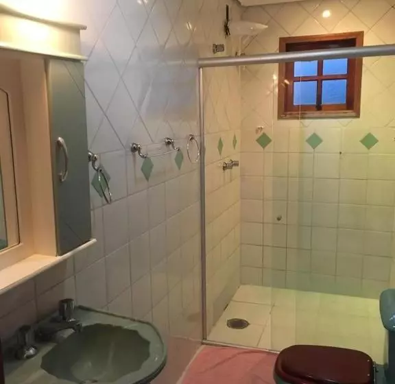 پانسیون Colinas Capivari Suites